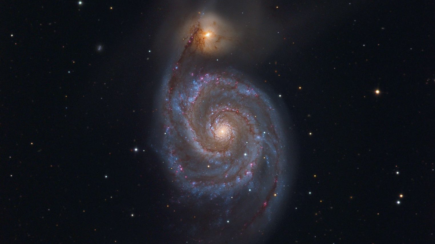Galaxia M 51 din constelația Câinii de vânătoare este una dintre cele mai impresionante galaxii de pe cerul de primăvară. Johannes Schedler / CCD Guide